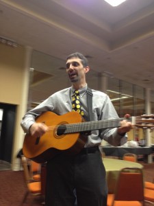 Rabbi Ed Bernstein plays guitar in public for first time.