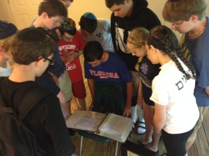 Campers at Ramah Darom examine the Matthew Eisenfeld and Sara Duker Memorial Volume, June, 2015.