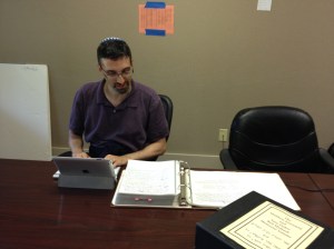 Rabbi Ed Bernstein transcribing handwritten sections of Memorial Volume (Photo by Rabbi Hillel Norry at Ramah Darom, June, 2015). 